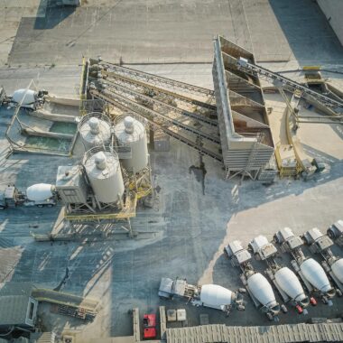White and Gray Robot on Gray Concrete Floor
