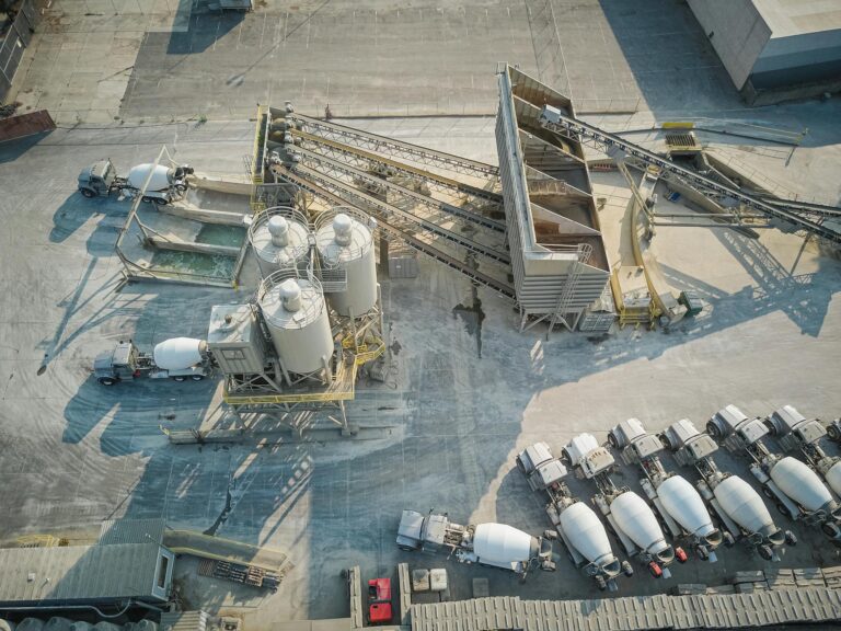 White and Gray Robot on Gray Concrete Floor
